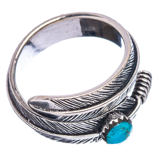 Sterling silver feather ring with turquoise cabochon, open adjustable shank.