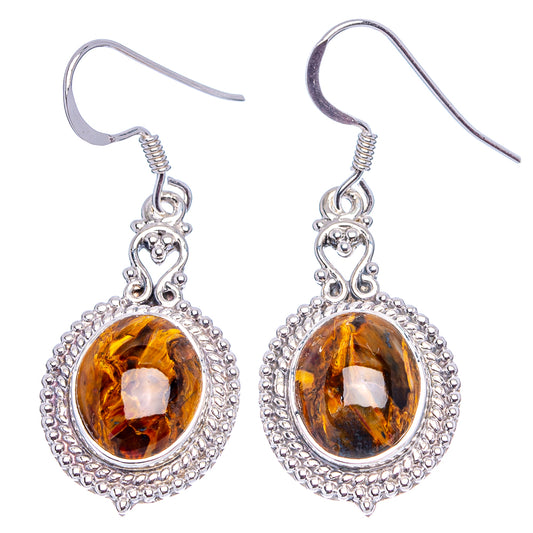 Sterling silver drop earrings with oval amber-gold pietersite stones in ornate halos