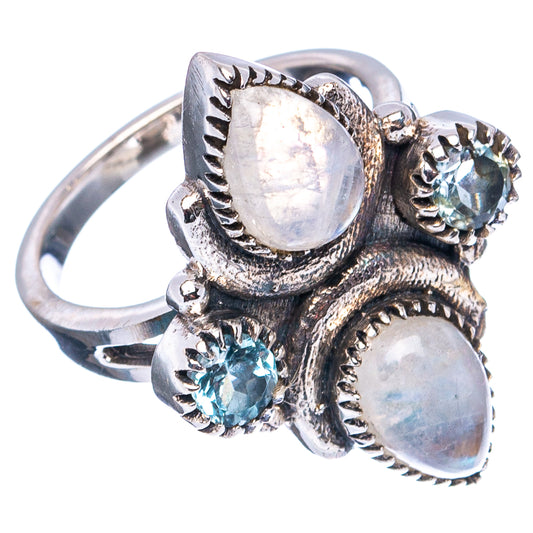 Sterling silver open band ring with oval rainbow moonstones and blue topaz round stones