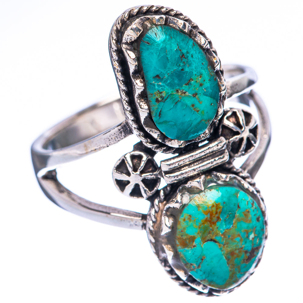 925 sterling silver ring with large oval turquoise cabochon, smaller bottom stone, floral accents