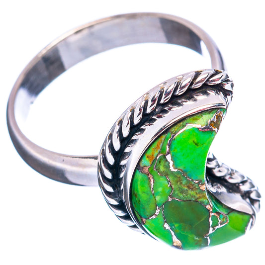 Green turquoise cabochon ring with braided silver-toned band and engraved sidework