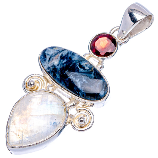 Sterling silver pendant with blue oval, opal moonstone pear, and garnet-red round center