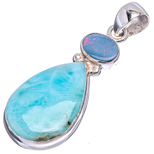 Sterling silver pendant with large pear-shaped light blue opal and round iridescent top