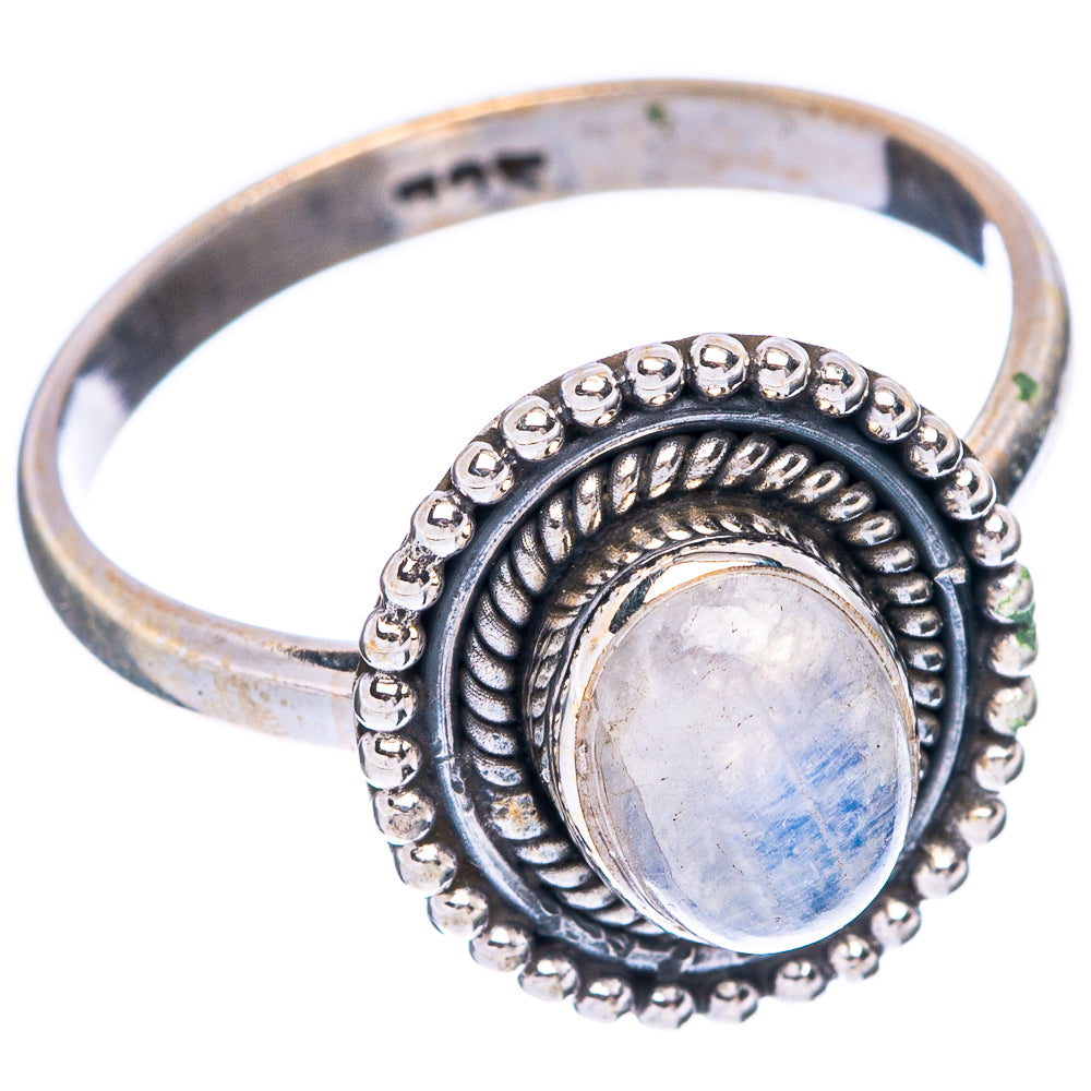 Sterling silver band ring with oval moonstone cabochon, engraved swirl and bead rim