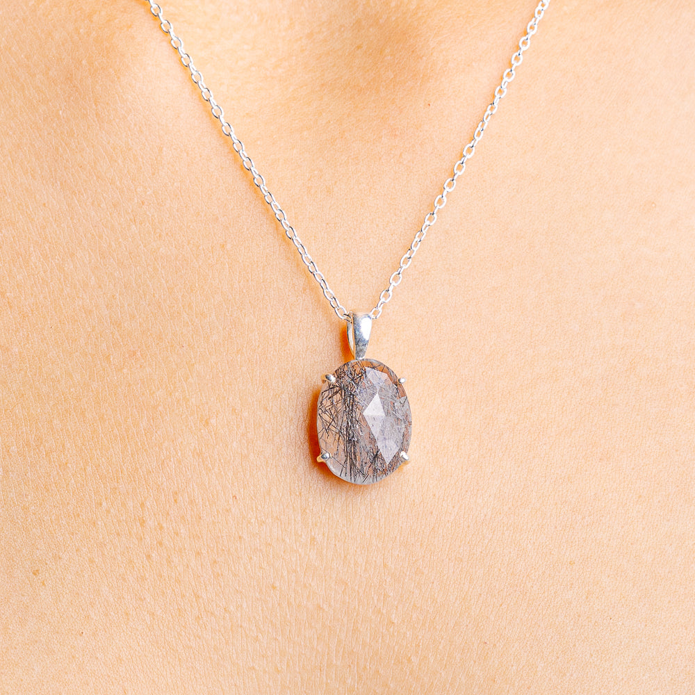 Sterling silver necklace with faceted tourmalinated quartz teardrop pendant