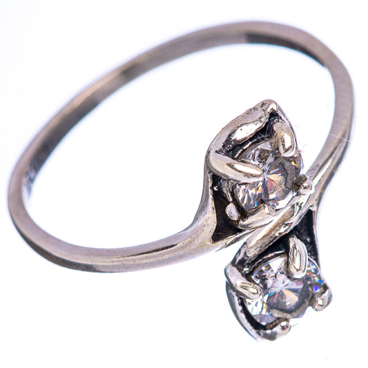 Sterling silver cubic zirconia ring with two stones in prong settings, angled view