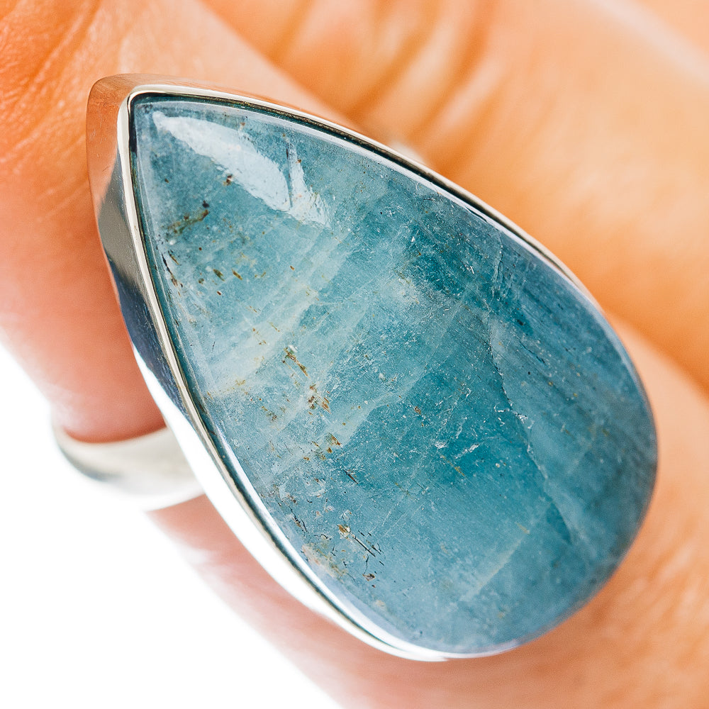 Teardrop aquamarine stone ring with silver-toned bezel and open band