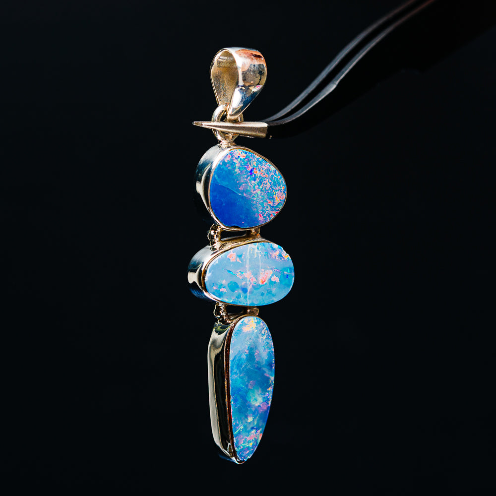 Sterling silver fire opal doublet pendant, blue oval and teardrop stones in bezel