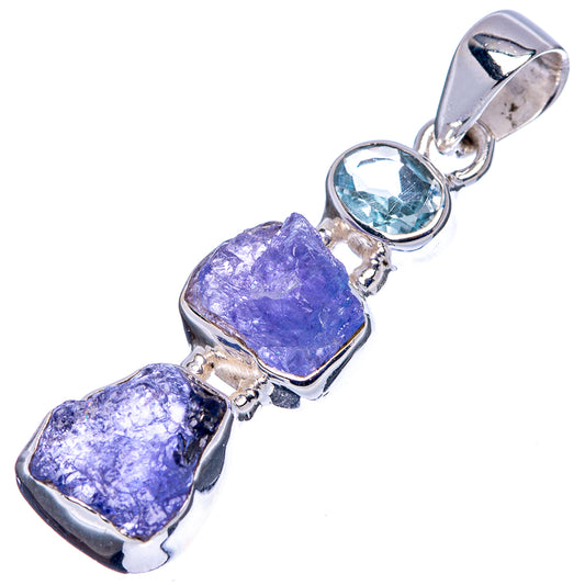 Sterling silver pendant with rough purple tanzanite blocks and blue topaz oval centerpiece