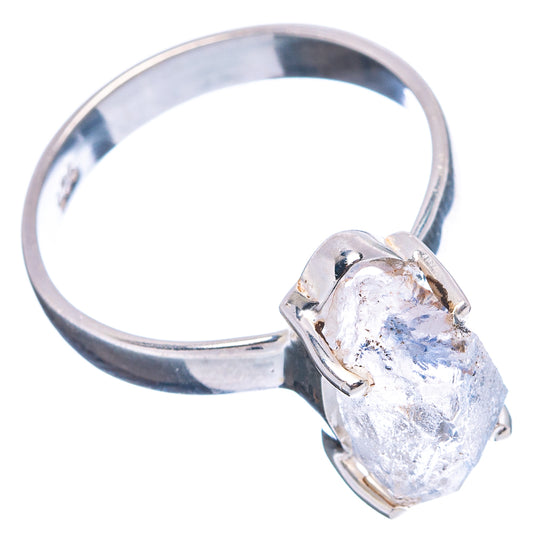 Sterling silver ring with oval rough blue-gray quartz stone in metal prongs