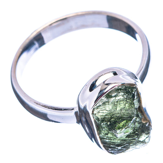 Sterling silver ring with textured dark green moldavite stone in rounded bezel