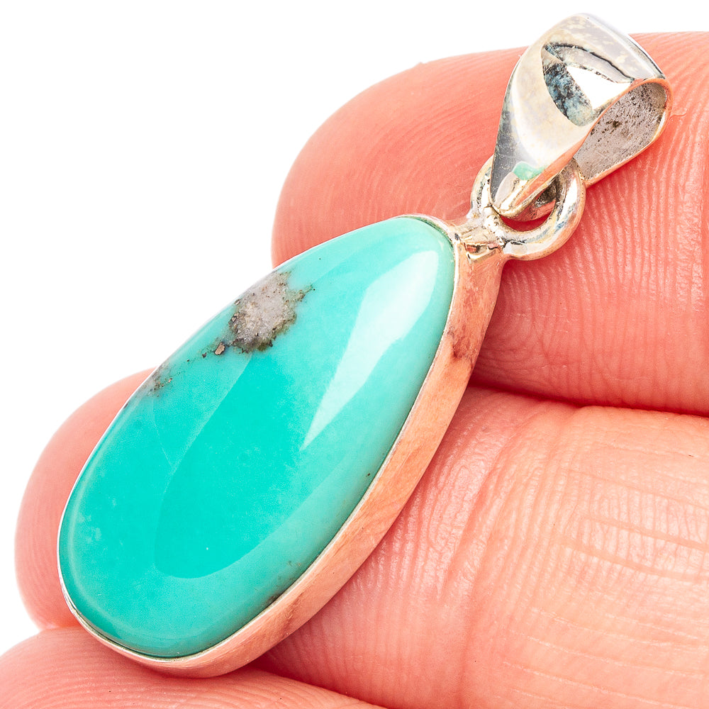 Teardrop turquoise pendant in 925 sterling silver setting with polished bail