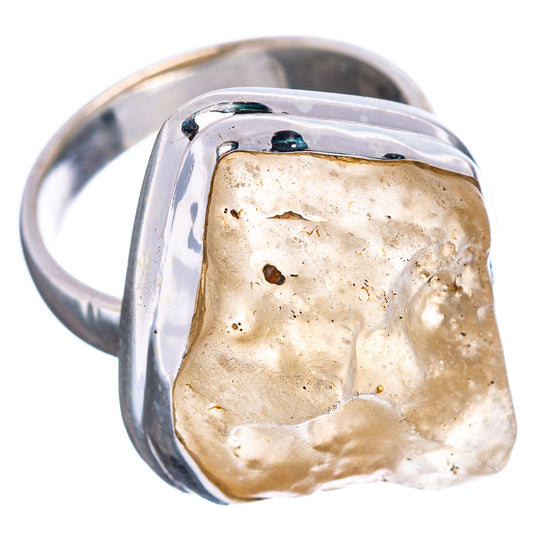 Sterling silver ring with translucent amber Libyan Desert Glass, dark flecks