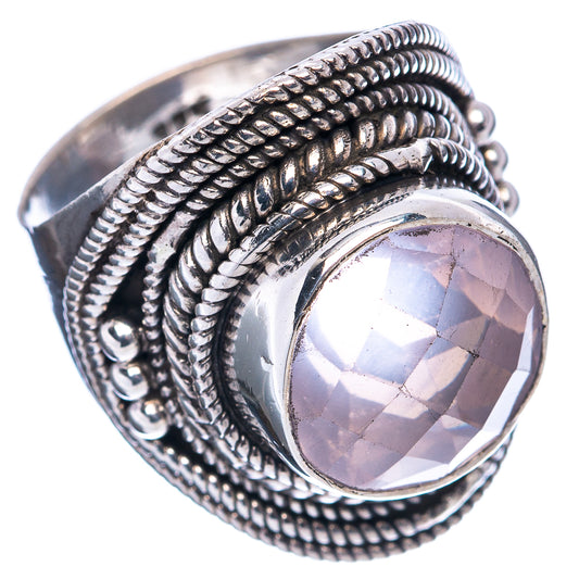Sterling silver ring with oval rose quartz and textured braided halo on band