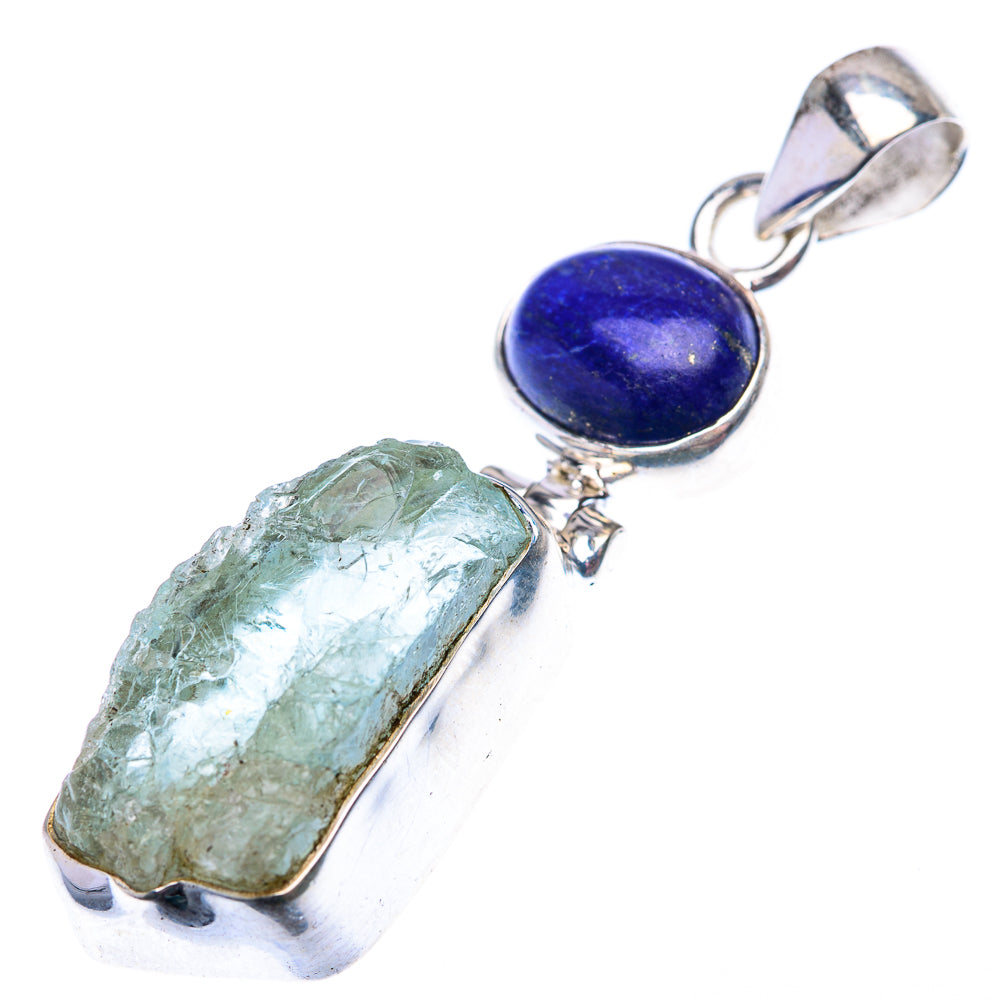 Sterling silver pendant with blue lapis oval cabochon and rough light green stone