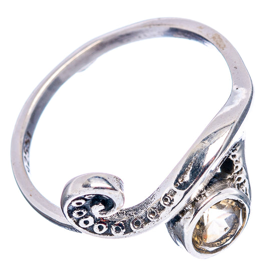 Sterling silver dainty wave ring with round yellow gemstone and open side setting