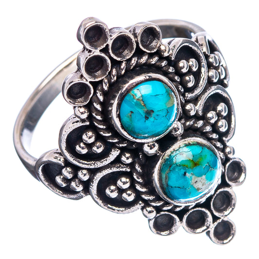 Turquoise cabochon sterling silver ring with detailed filigree and two oval stones