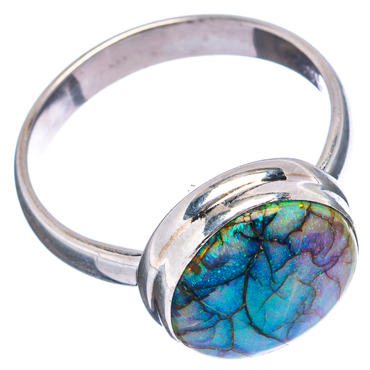 Sterling silver ring with round blue-green opal cabochon in a raised bezel