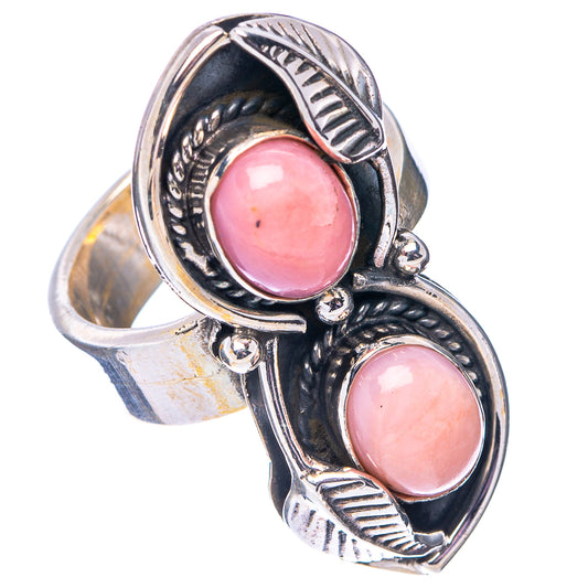 Adjustable sterling silver ring with oval pink opal stones and decorative side panels