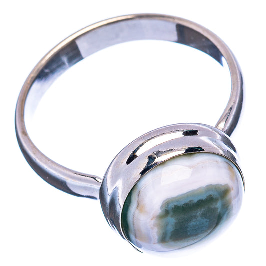 Sterling silver ring with oval ocean jasper cabochon and open band, side view