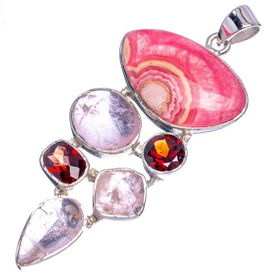 925 sterling silver pendant with pink rhodochrosite oval, red garnet, and quartz stones