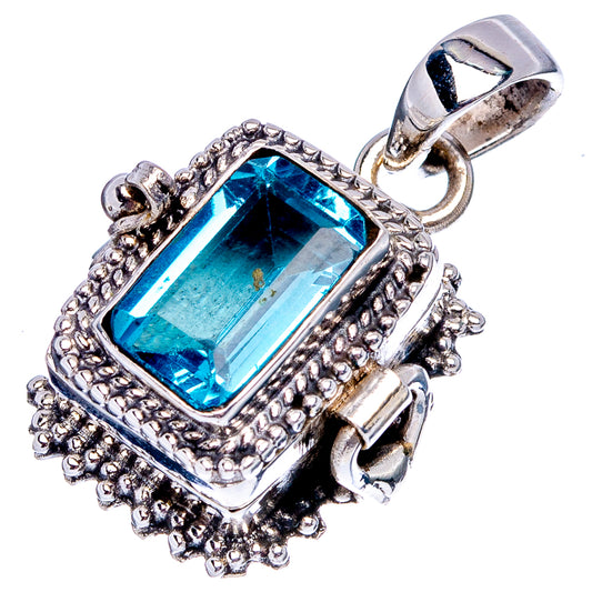 Square blue topaz pendant in detailed silver frame with clasped bail