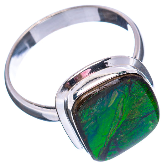 Sterling silver ammolite ring with green iridescent oval stone and polished band