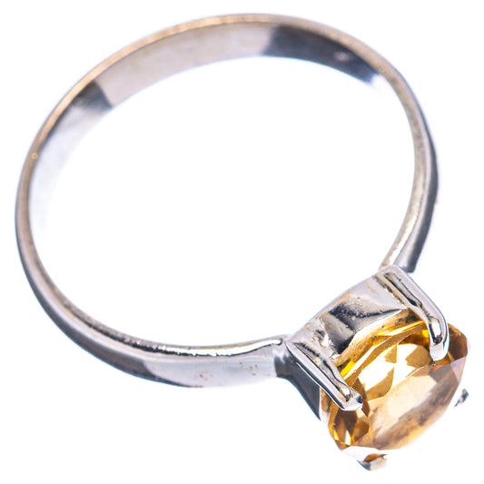 Sterling silver ring with prong-set round citrine gemstone, side view