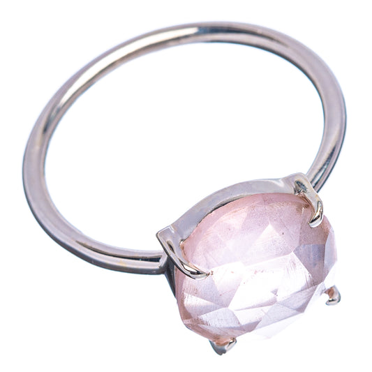 Faceted rose quartz cocktail ring with oval pink stone and silver prong setting