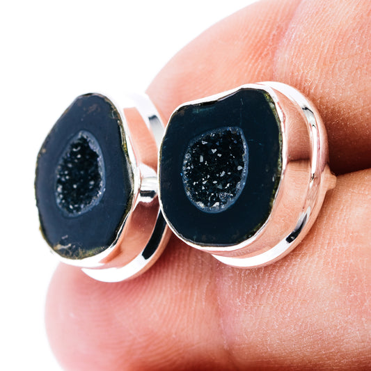 Sterling silver geode stud earrings with black druzy stone in oval bezel, side view
