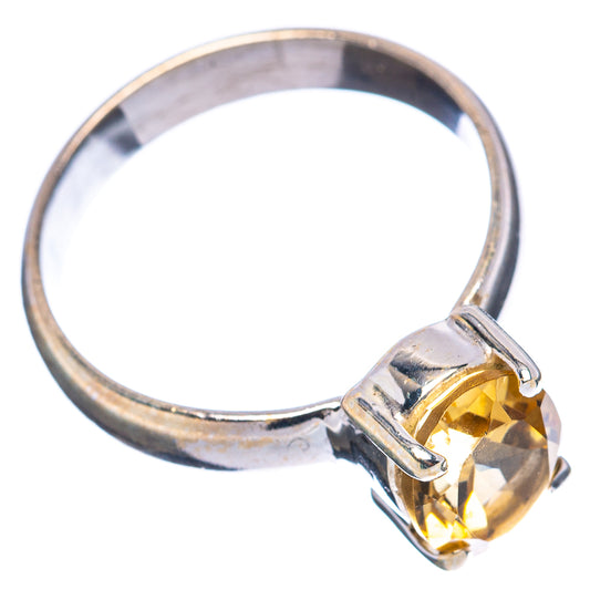 Sterling silver citrine ring, oval yellow stone bezel setting on band
