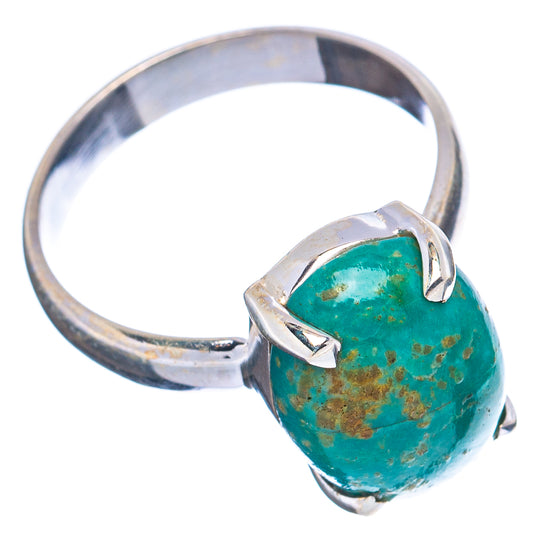 Turquoise oval cabochon ring with .925 sterling silver band and side prong setting