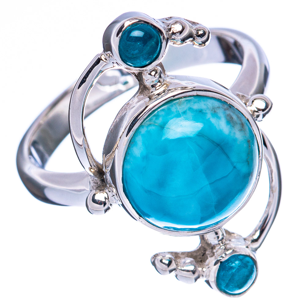 Sterling silver ring featuring oval blue-green center stone with bezel and three teal gems