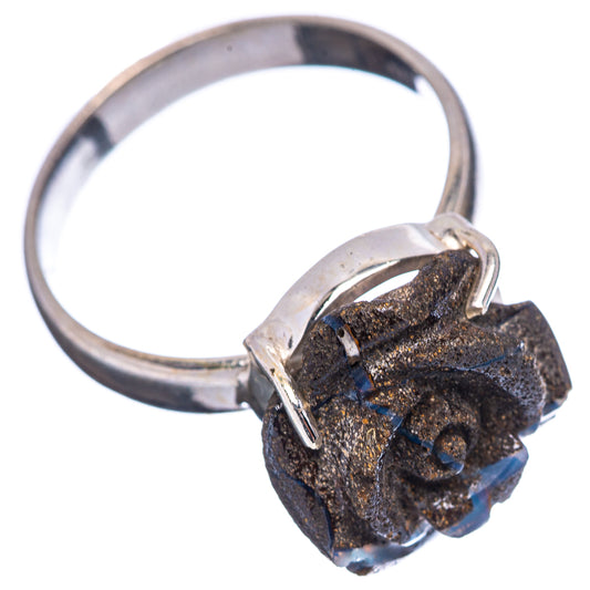 Sterling silver opal rose ring, angled view, dark boulder center with blue opal