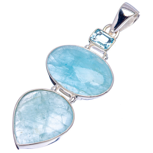 Sterling silver pendant featuring oval blue gemstones with top blue stone accent