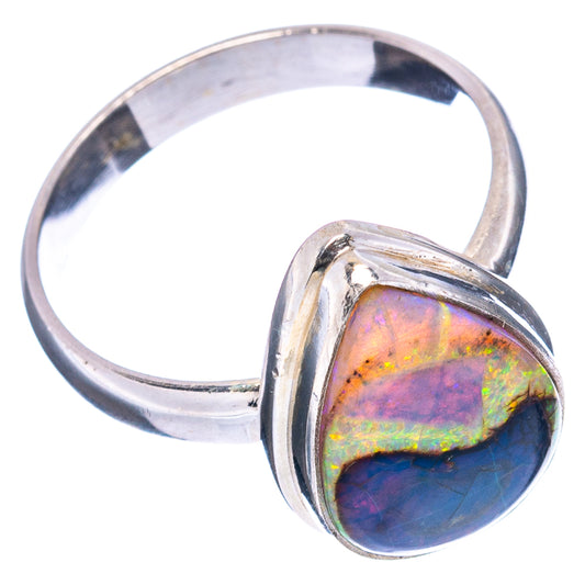 Sterling silver opal ring, side view; teardrop stone with blue and multicolor iridescence