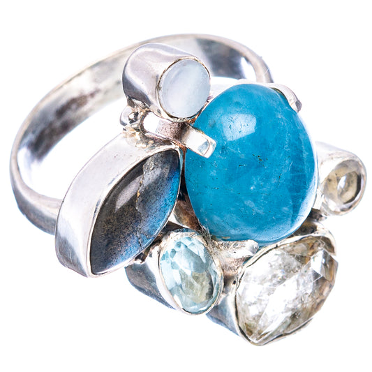 Sterling silver ring featuring blue oval gemstone with blue and clear accents