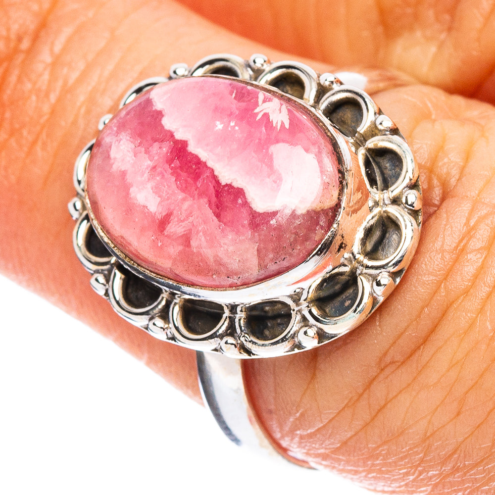 Oval pink rhodochrosite cabochon ring in 925 sterling silver with ornate bezel