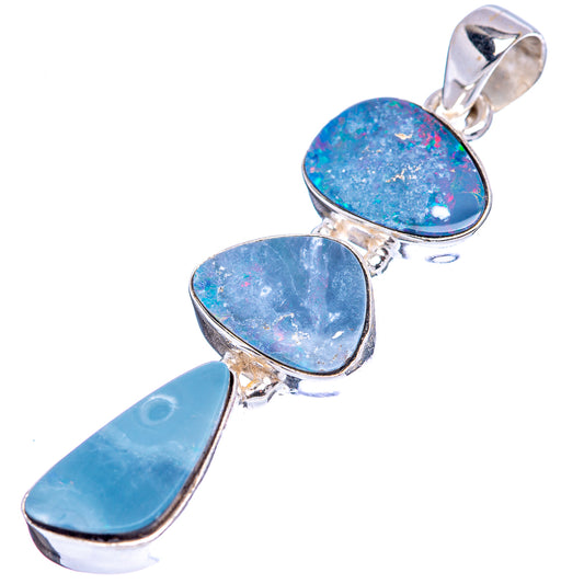 Sterling silver opal doublet pendant with three oval blue stones in bezel settings