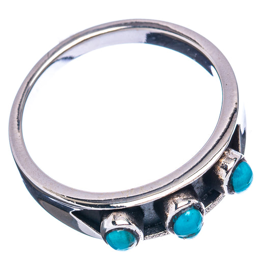 Sterling silver ring with three turquoise round cabochon stones, open side view
