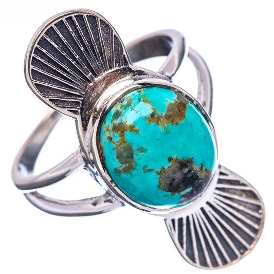 Sterling silver ring with oval turquoise cabochon and raised fan leaf side settings