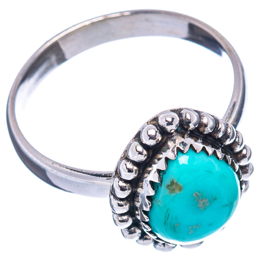 Sterling silver turquoise ring, oval stone framed by round bead border on open band