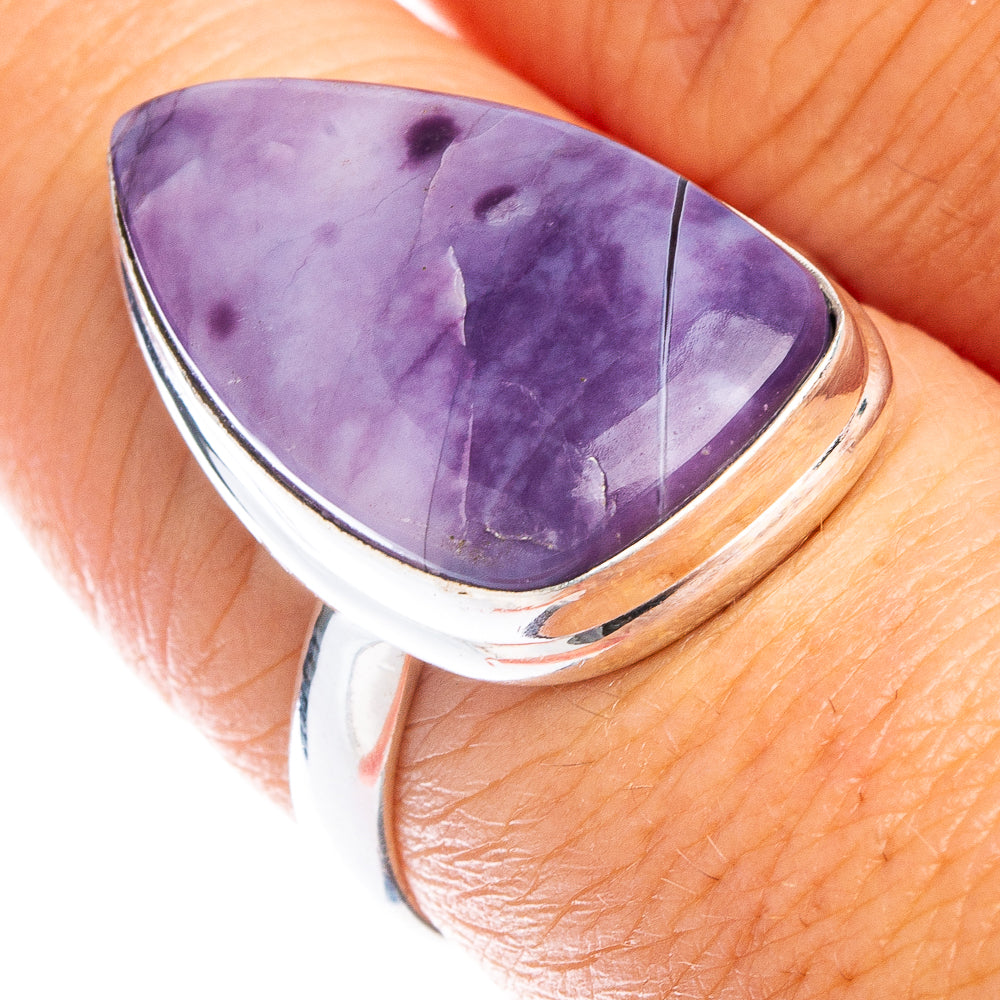 Sterling silver ring with purple teardrop cabochon gemstone, polished bezel setting