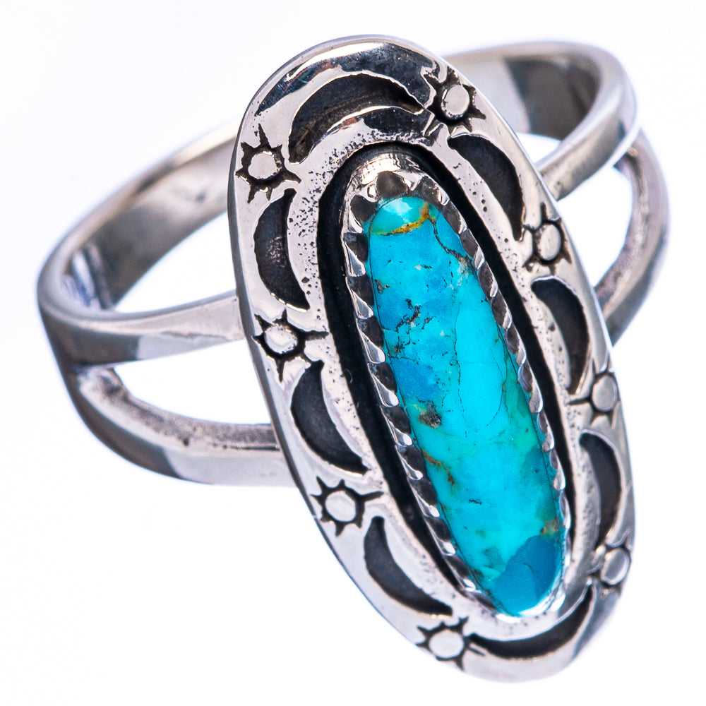 Turquoise cabochon ring in sterling silver with oval setting and engraved floral border
