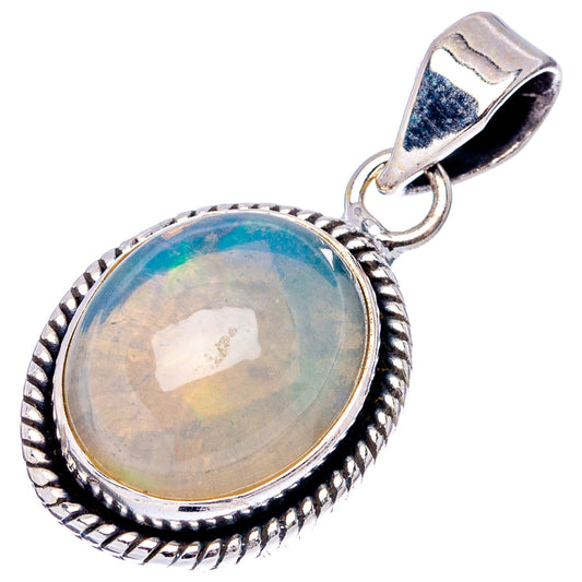 Sterling silver oval opal pendant with rope border and bail; blue opal cabochon