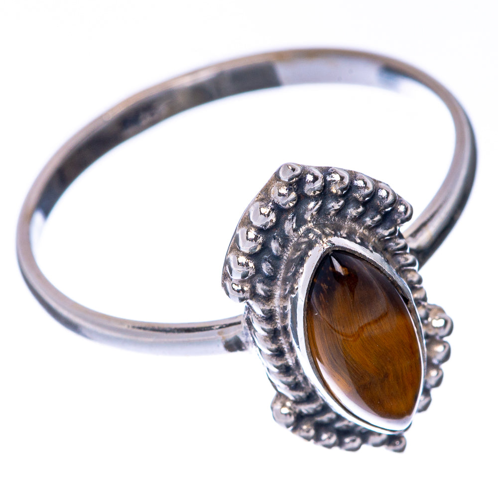 Dainty sterling silver ring with oval tiger eye gemstone and textured bezel