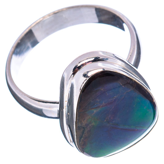 Sterling silver ammolite ring with dark oval iridescent stone and curved metal bezel