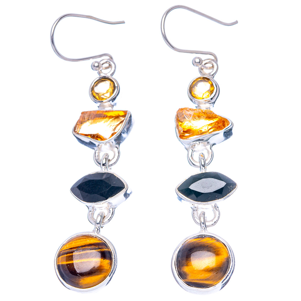 Pair of sterling silver drop earrings: citrine top, black faceted stone, tiger eye rounds