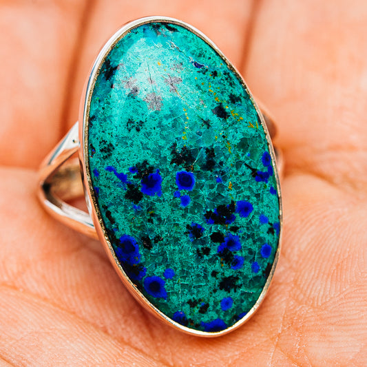 Sterling silver oval azurite ring showing full face, blue and teal speckled stone