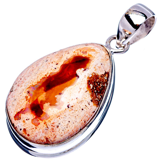 Teardrop fire opal pendant with silver bail, red and orange glow in speckled stone.